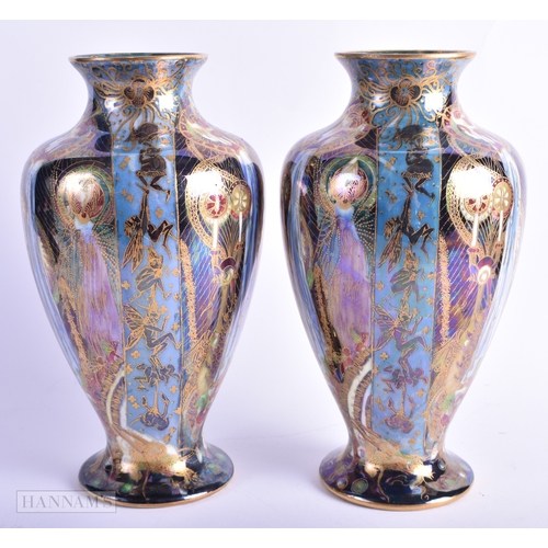 160 - A FINE PAIR OF WEDGWOOD FAIRYLAND LUSTRE VASES by Daisy Makeig Jones. 22 cm x 11 cm.