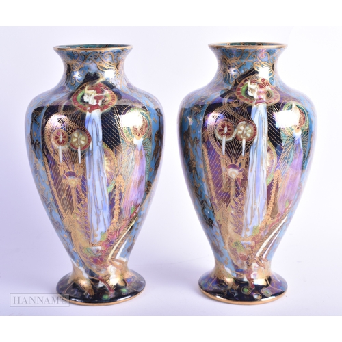 160 - A FINE PAIR OF WEDGWOOD FAIRYLAND LUSTRE VASES by Daisy Makeig Jones. 22 cm x 11 cm.