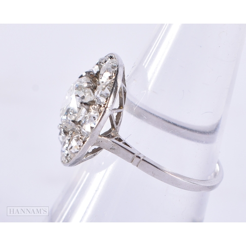 169 - A VERY FINE ART DECO STYLE 18CT WHITE GOLD DIAMOND CLUSTER RING. The central stone is 2CT, the surro... 