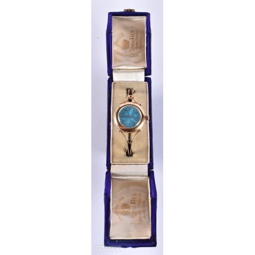 172 - A LOVELY EARLY 20TH CENTURY GOLD AND GUILLOCHE ENAMEL BANGLE WATCH. 30 grams overall. Running. 3 cm ... 