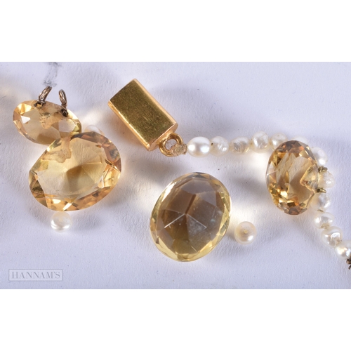 174 - AN EDWARDIAN SEED PEARL AND CITRINE NECKLACE. 22 grams.