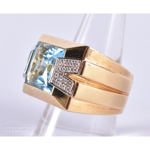 177 - A FINE 18CT GOLD BLUE TOPAZ AND DIAMOND VERSACE RING. 25 grams. Topaz 1.25 cm x 1 cm.