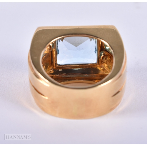 177 - A FINE 18CT GOLD BLUE TOPAZ AND DIAMOND VERSACE RING. 25 grams. Topaz 1.25 cm x 1 cm.