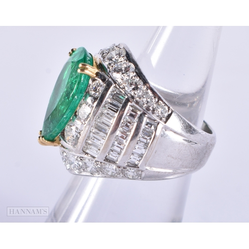 178 - A FINE 18CT WHITE GOLD PEAR SHAPED EMERALD AND DIAMOND RING. 16.1 grams. Emerald 1.5 cm x 0.75 cm.