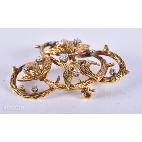 182 - A 1960S 18CT GOLD AND DIAMOND BROOCH. London 1967. Maker EJLd. 12 grams. 4 cm x 3.5 cm.