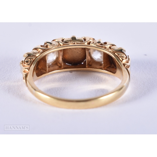 183 - A LOVELY LATE VICTORIAN SPLIT PEARL GOLD AND DIAMOND FIVE STONE RING of approximately 0.5 cts of dia... 