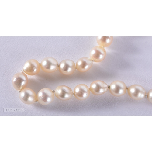 188 - A 9CT DIAMOND AND PEARL NECKLACE.15.9 grams. 35 cm long.