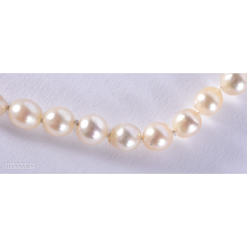 188 - A 9CT DIAMOND AND PEARL NECKLACE.15.9 grams. 35 cm long.