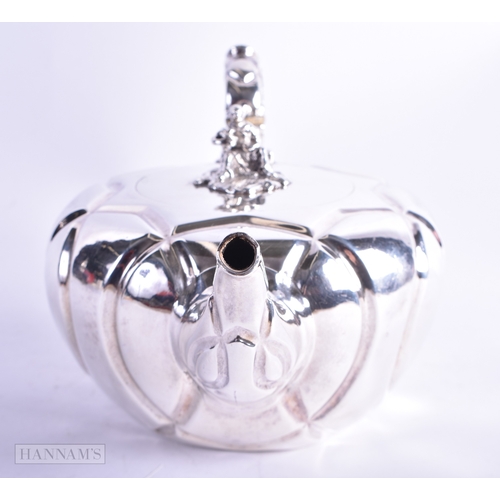 19 - AN EARLY VICTORIAN SILVER TEAPOT mounted with a seated Chinese male. London 1845. 516 grams. 24 cm x... 