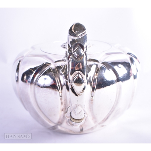 19 - AN EARLY VICTORIAN SILVER TEAPOT mounted with a seated Chinese male. London 1845. 516 grams. 24 cm x... 