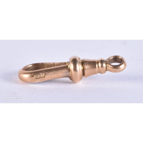 198 - A 15CT GOLD CLIP. 1.7 grams. 2 cm x 0.75 cm.