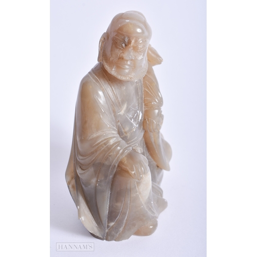 205 - A 19TH CENTURY CHINESE CARVED SOAPSTONE FIGURE OF A SCHOLAR Qing. 12 cm x 6 cm.