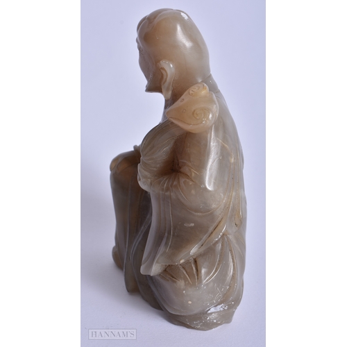 205 - A 19TH CENTURY CHINESE CARVED SOAPSTONE FIGURE OF A SCHOLAR Qing. 12 cm x 6 cm.