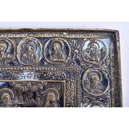 21 - AN 18TH CENTURY RUSSIAN ENAMELLED BRONZE ICON decorated with extensive saints and Cyrillic scripture... 