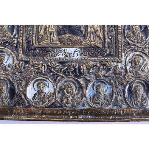 21 - AN 18TH CENTURY RUSSIAN ENAMELLED BRONZE ICON decorated with extensive saints and Cyrillic scripture... 