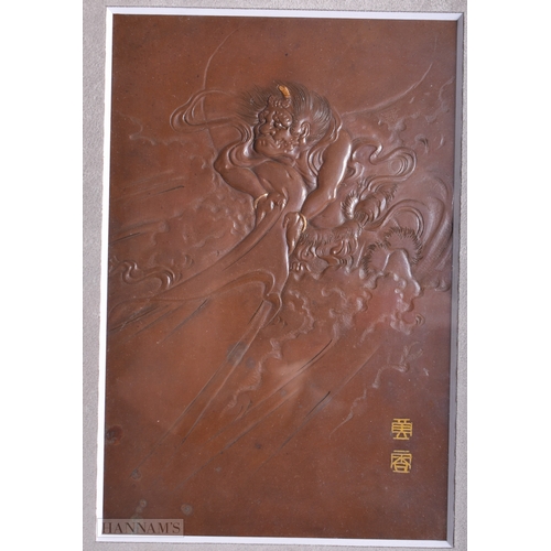 219 - A 19TH CENTURY JAPANESE MEIJI PERIOD BRONZE PLAQUE decorated in relief with a male in the clouds. 30... 