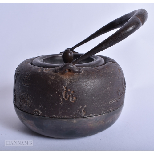 222 - A VERY RARE 19TH CENTURY JAPANESE MEIJI PERIOD BRONZE AND IRON TETSUBIN decorated with calligraphy. ... 