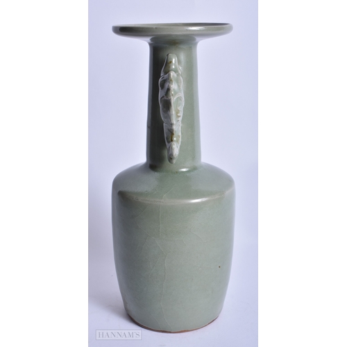 223 - A CHINESE CELADON TWIN HANDLED VASE probably Song/Yuan. 24 cm x 8 cm.