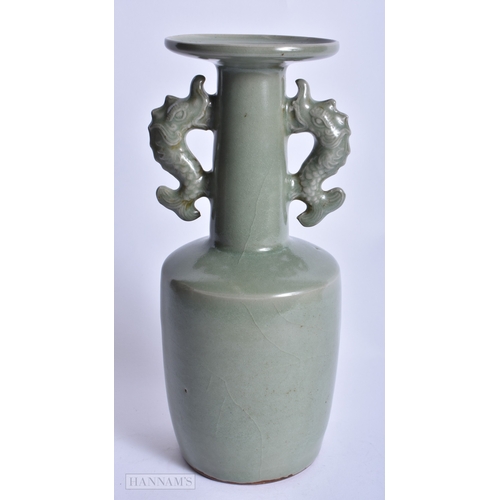 223 - A CHINESE CELADON TWIN HANDLED VASE probably Song/Yuan. 24 cm x 8 cm.