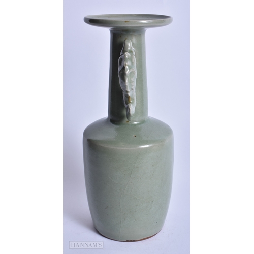 223 - A CHINESE CELADON TWIN HANDLED VASE probably Song/Yuan. 24 cm x 8 cm.