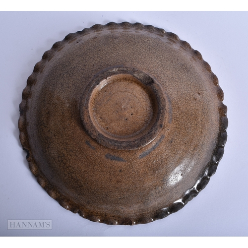 226 - A CHINESE GE TYPE SCALLOPED STONEWARE DISH probably Song/Yuan. 21 cm wide.