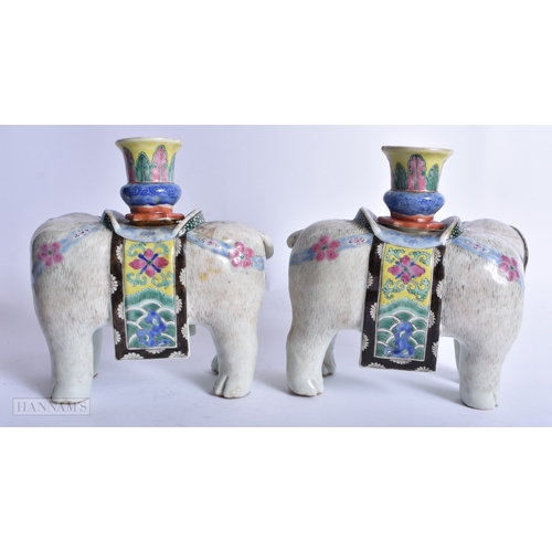 239 - A PAIR OF 19TH CENTURY CHINESE FAMILLE ROSE PORCELAIN ELEPHANTS Qing. 16 cm x 14 cm.