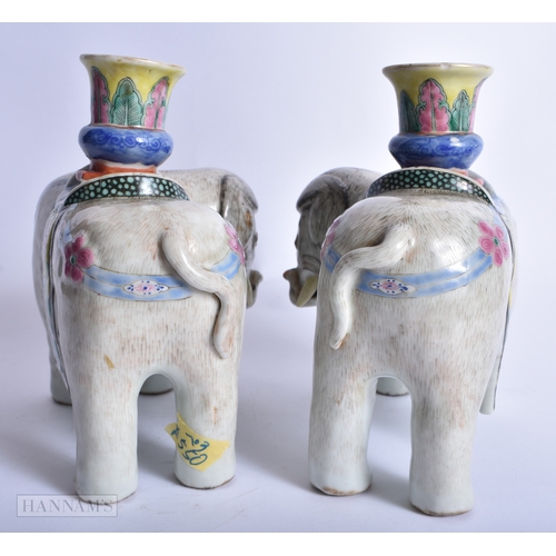 239 - A PAIR OF 19TH CENTURY CHINESE FAMILLE ROSE PORCELAIN ELEPHANTS Qing. 16 cm x 14 cm.