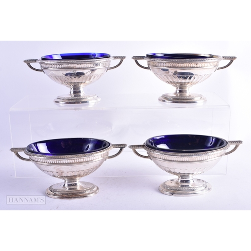 31 - A SET OF SEVEN GEORGE III SILVER PLATED NEO CLASSICAL SALTS. 14.75 cm x 6.25 cm. (7)