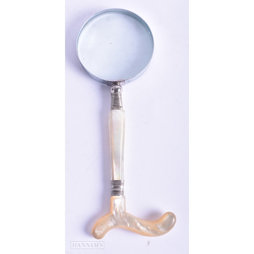 33 - AN EDWARDIAN SILVER MOUNTED MOTHER OF PEARL MAGNIFYING GLASS. 22 cm long.