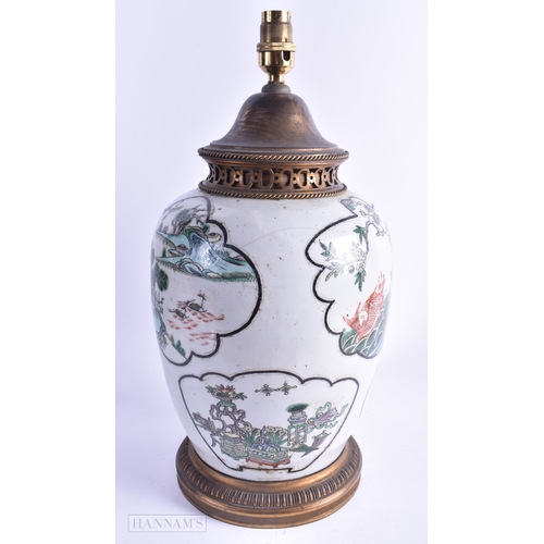 50 - A LARGE 19TH CENTURY CHINESE FAMILLE VERTE PORCELAIN LAMP Kangxi style, painted with carp, birds and... 