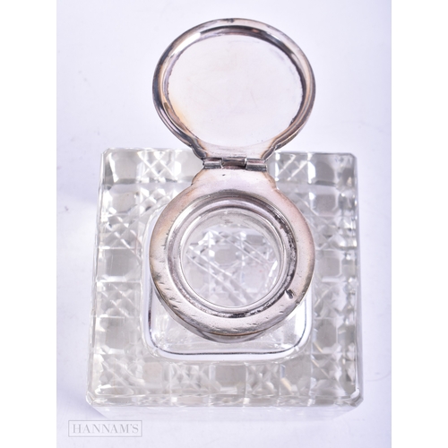 67 - AN EDWARDIAN SILVER MOUNTED GLASS INKWELL. Birmingham 1906. 10 cm square.