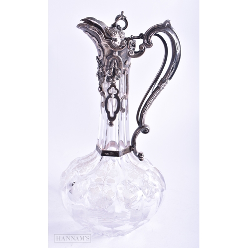 68 - AN EARLY VICTORIAN SILVER MOUNTED ENGRAVED GLASS CLARET JUG. London 1857. 1447 grams overall. 30 cm ... 