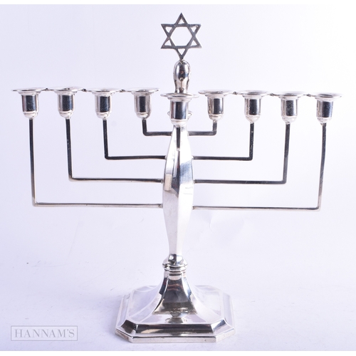 69 - AN ART DECO SILVER JUDAIC MENORAH. Birmingham 1936. 419 grams overall. 23 cm x 23 cm.