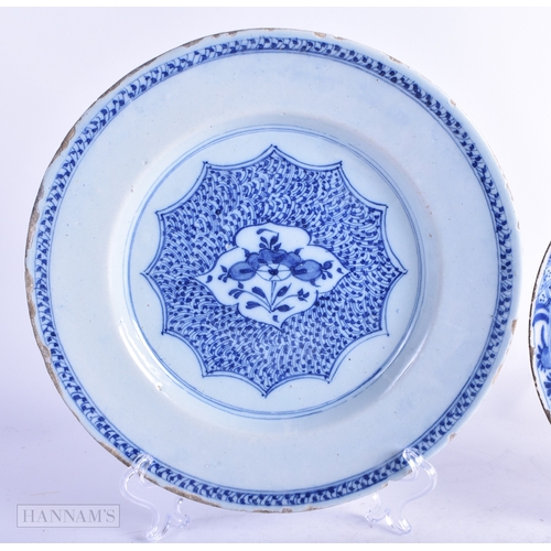 75 - AN 18TH CENTURY ENGLISH CREAMWARE TEABOWL AND SAUCER together with two Delft plates. Largest 21 cm d... 