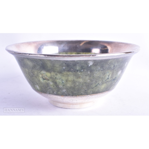 80 - AN ANTIQUE CHINESE SILVER MOUNTED MOSS AGATE STONE BOWL. 137.5 grams. 12.75 cm diameter.