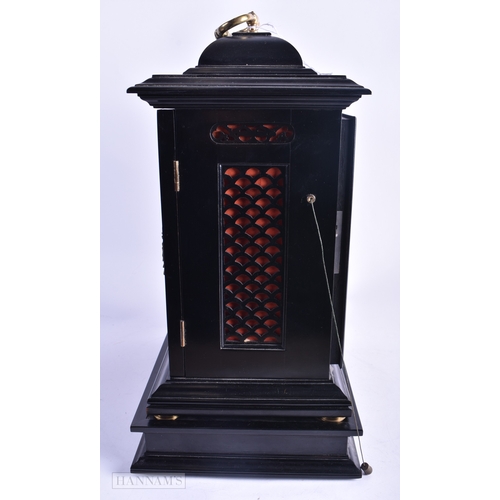 82 - A GEORGE III EBONISED MANTEL CLOCK signed Frederick Allen Derby, the case carved with scrolling fret... 