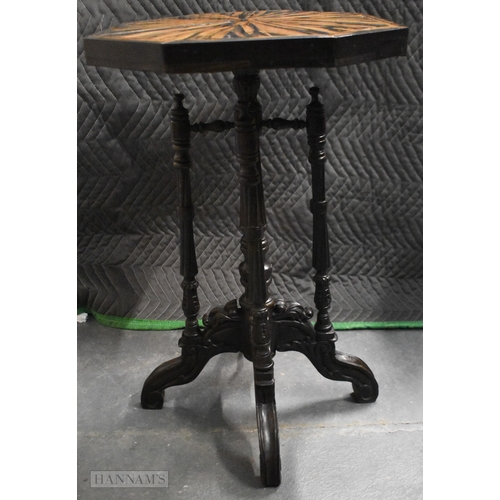 616 - A LOVELY 19TH CENTURY ANGLO INDIAN CARVED COROMANDEL TABLE with beautifully figured top and carved c... 