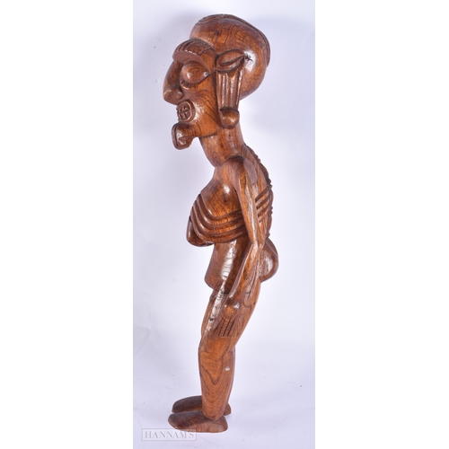 101 - AN EASTER ISLANDS CARVED WOOD FIGURE OF A MALE. 38 cm high.