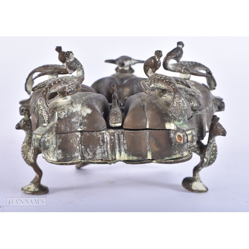 102 - AN ANTIQUE INDIAN BRONZE PANDAN SPICE BOX together with a small bronze buddha. Largest 9.75 cm wide.... 