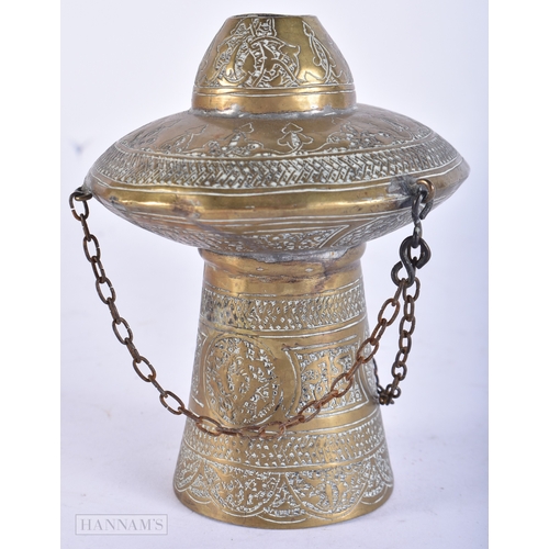 107 - A 19TH CENTURY ISLAMIC MIDDLE EASTERN BRASS HANGING CENSER decorated with scripture. 12cm high.