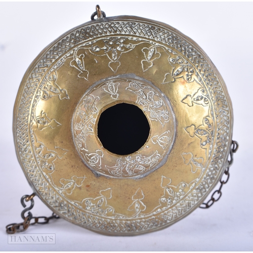 107 - A 19TH CENTURY ISLAMIC MIDDLE EASTERN BRASS HANGING CENSER decorated with scripture. 12cm high.