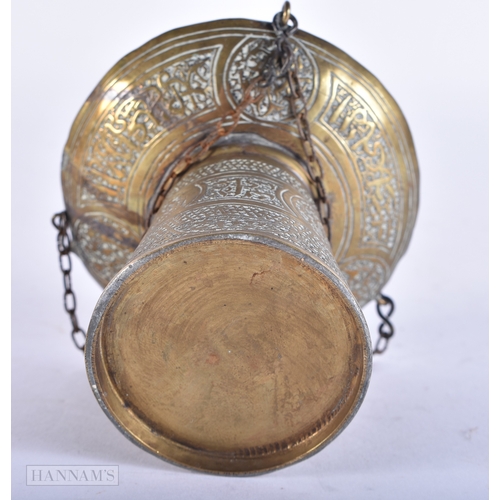 107 - A 19TH CENTURY ISLAMIC MIDDLE EASTERN BRASS HANGING CENSER decorated with scripture. 12cm high.