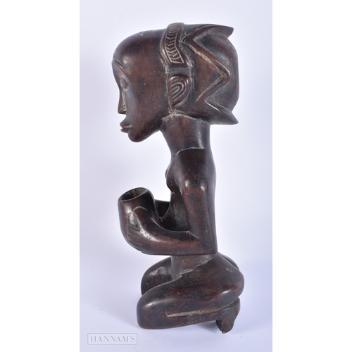 147 - AN AFRICAN TRIBAL CARVED WOOD FIGURE together with another Indian wood deity. Largest 23.5 cm high. ... 