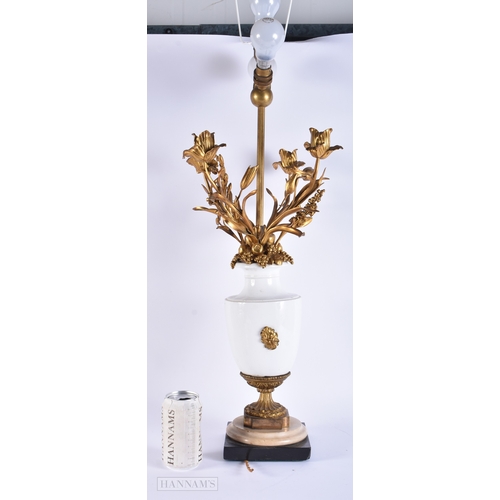 149 - AN UNUSUAL LARGE ANTIQUE FRENCH PORCELAIN AND ORMOLU COUNTRY HOUSE LAMP. 82 cm high.