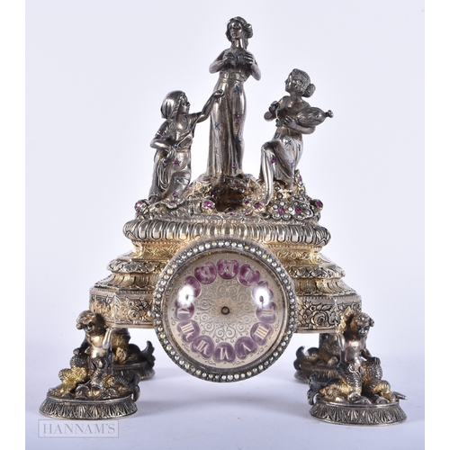 176 - A FINE 19TH CENTURY AUSTRIAN VIENNA SILVER RUBY AND ENAMEL CLOCK formed with figures and maidens. 92... 