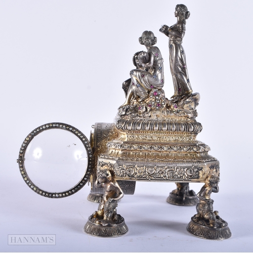 176 - A FINE 19TH CENTURY AUSTRIAN VIENNA SILVER RUBY AND ENAMEL CLOCK formed with figures and maidens. 92... 