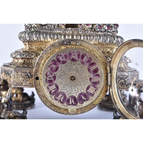 176 - A FINE 19TH CENTURY AUSTRIAN VIENNA SILVER RUBY AND ENAMEL CLOCK formed with figures and maidens. 92... 