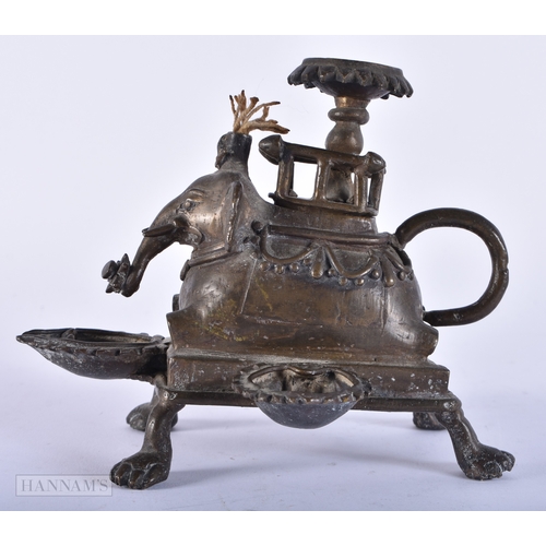 179 - AN ANTIQUE INDIAN BRONZE ELEPHANT OIL LAMP. 13 cm x 13 cm.