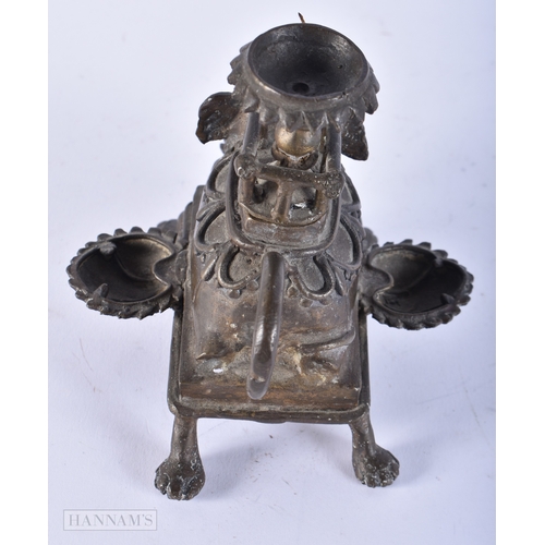 179 - AN ANTIQUE INDIAN BRONZE ELEPHANT OIL LAMP. 13 cm x 13 cm.