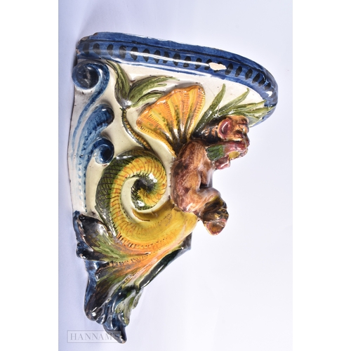 333 - AN EARLY 19TH CENTURY ITALIAN FAIENCE POTTERY GROTESQUE WALL BRACKET. 27cm x 20 cm.